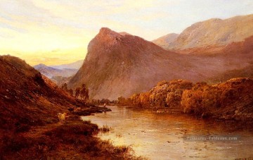 Coucher de soleil dans le paysage de Glen Alfred de Breanski Snr Peinture à l'huile